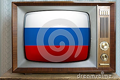 Old tube vintage TV with the national flag of Russia on the screen, the concept of eternal values â€‹â€‹on television, global Stock Photo